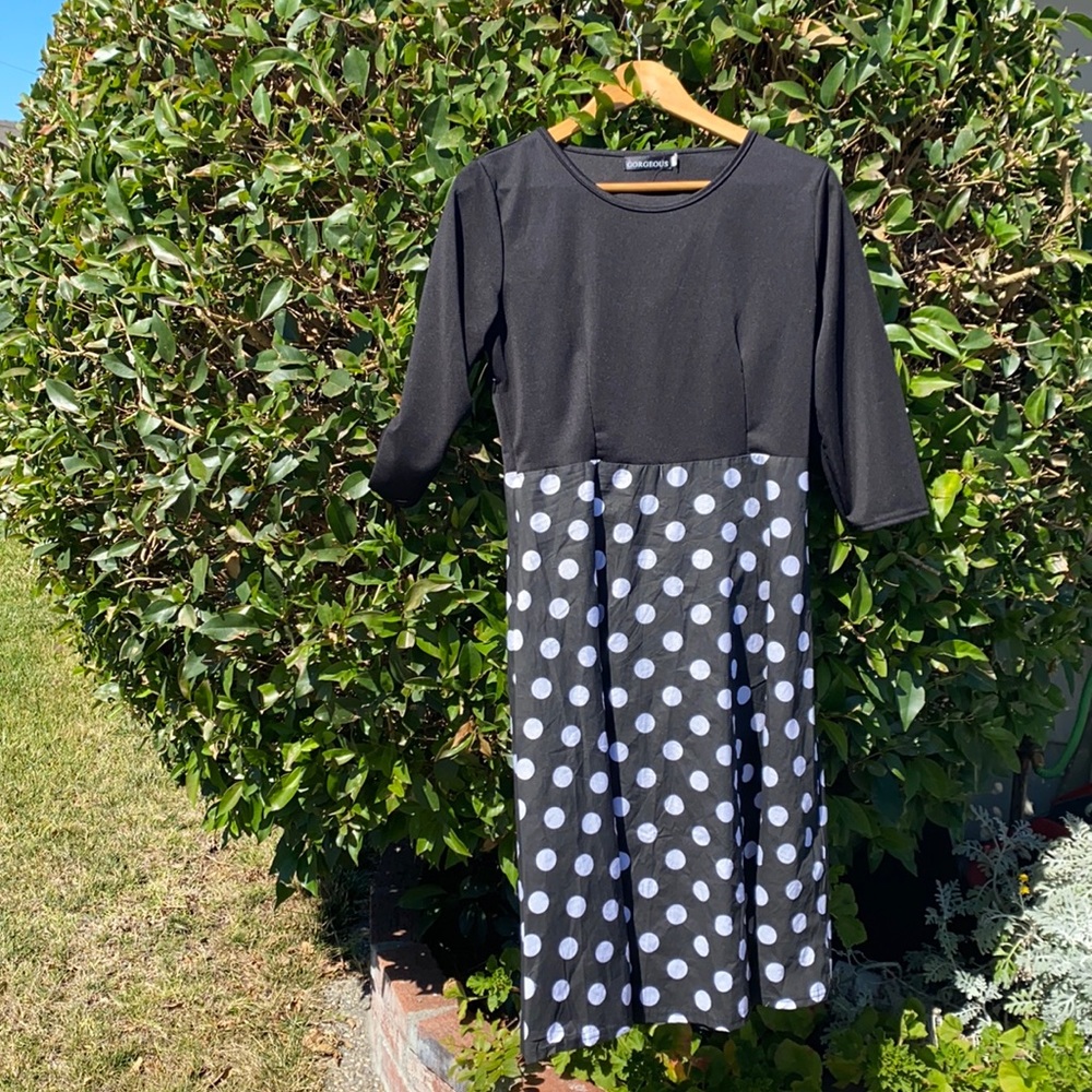 Never worn. Side zipper.  XL